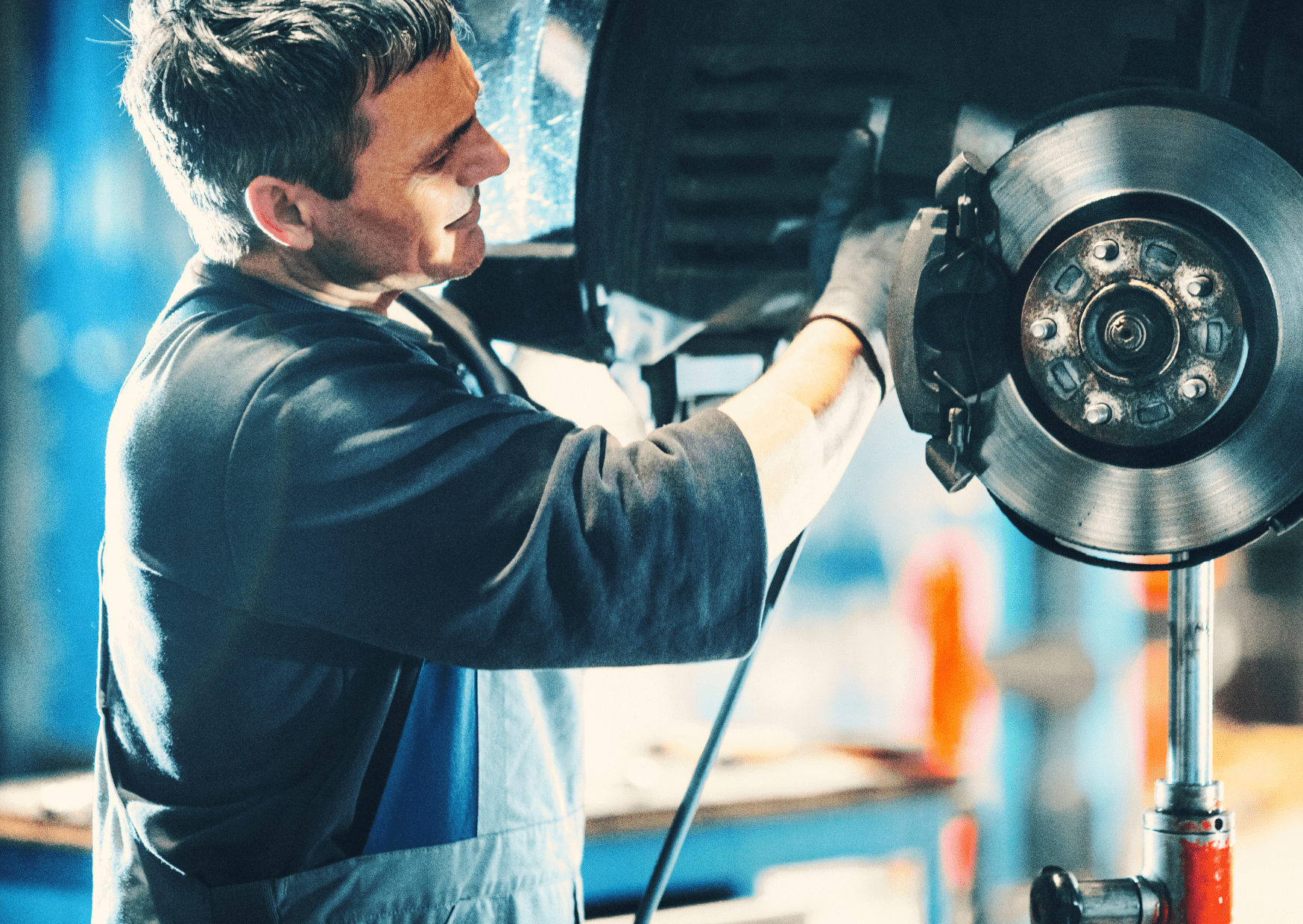 A trained technician inspects braking systems, such as brake pads, rotors, calipers, and brake lines.