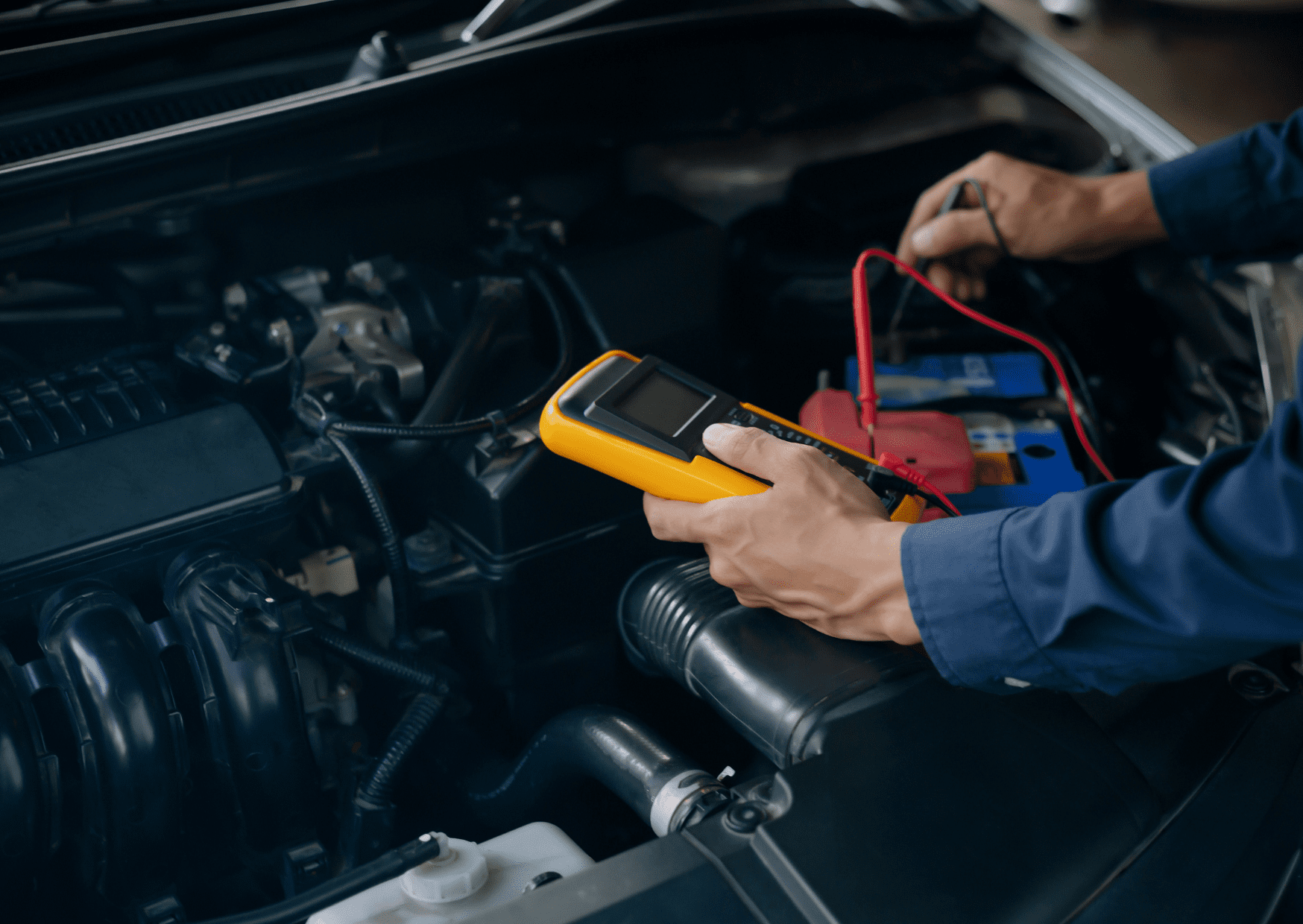 A person checking the vehicle's performance for preventive and address minor issues before they escalate.